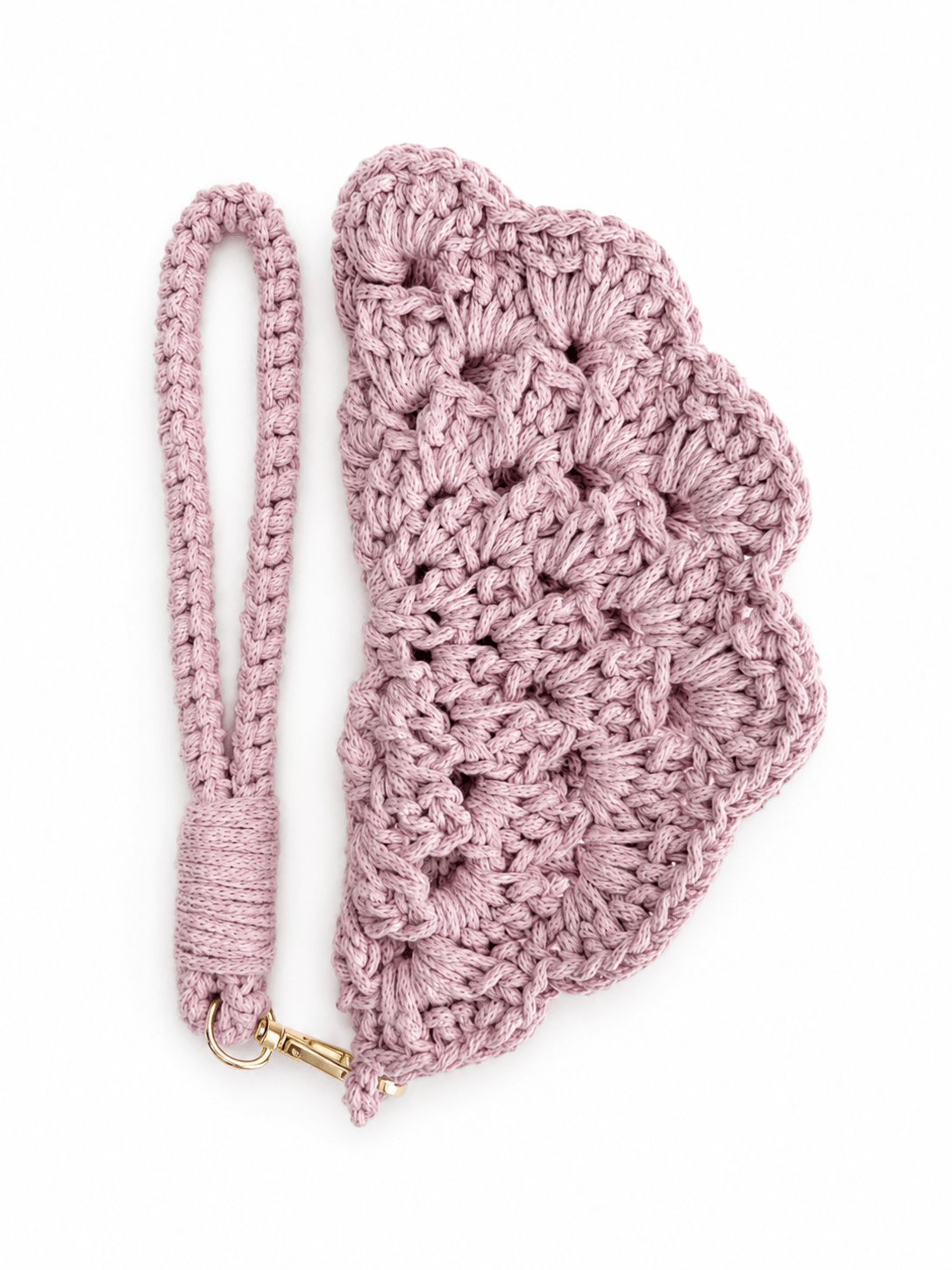 First studio view of the dusty-lavender crocheted Bloom Eyewear Sleeve with a detachable crochet handle and gold-tone hardware.