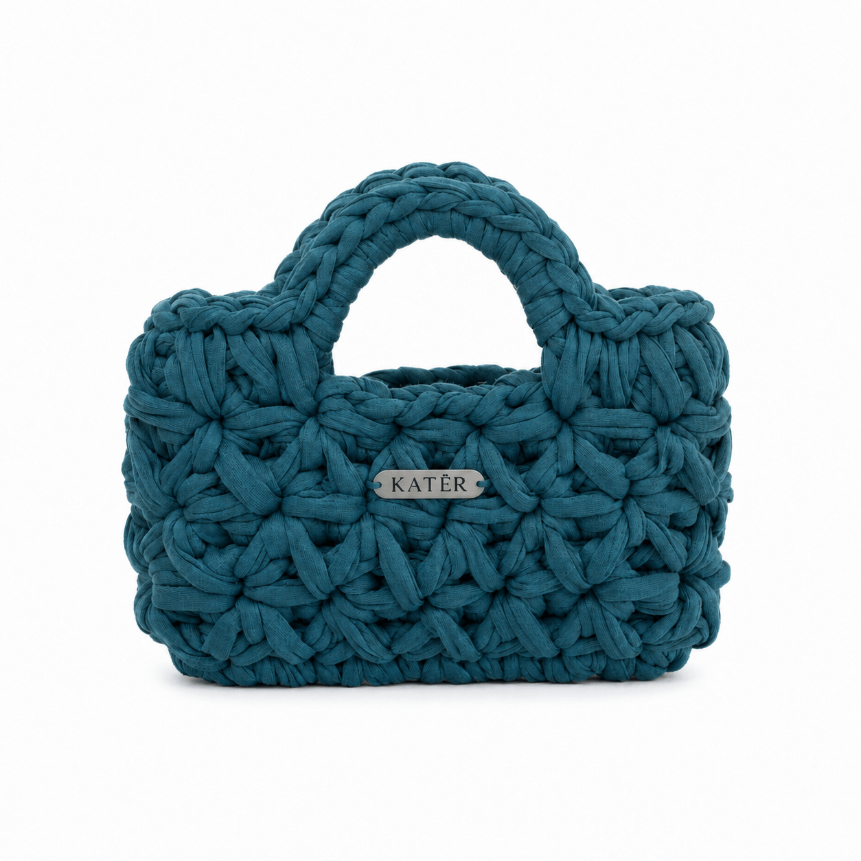 Deep teal crochet handbag with floral stitches and two rounded handles.