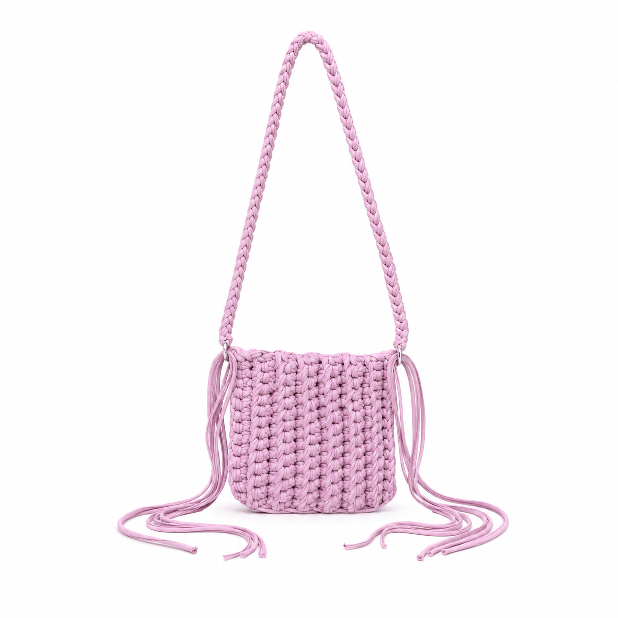 Bubblegum pink crochet crossbody bag with a braided strap and cascading fringe.